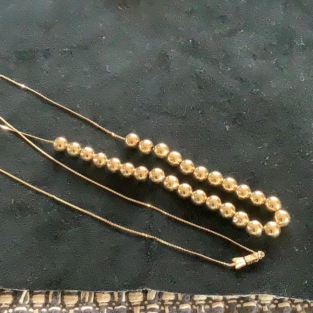 Beautiful gift..add a ball 14 kt necklace.  28 balls, 30 in  length 10 gram